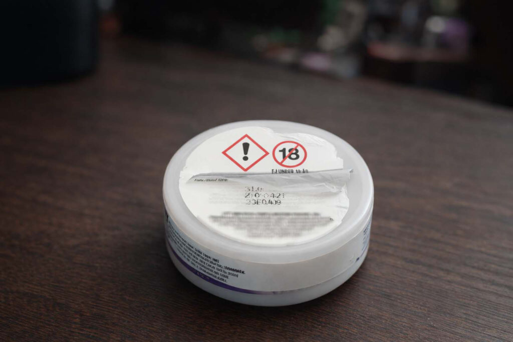 Snusdosa fel etikett