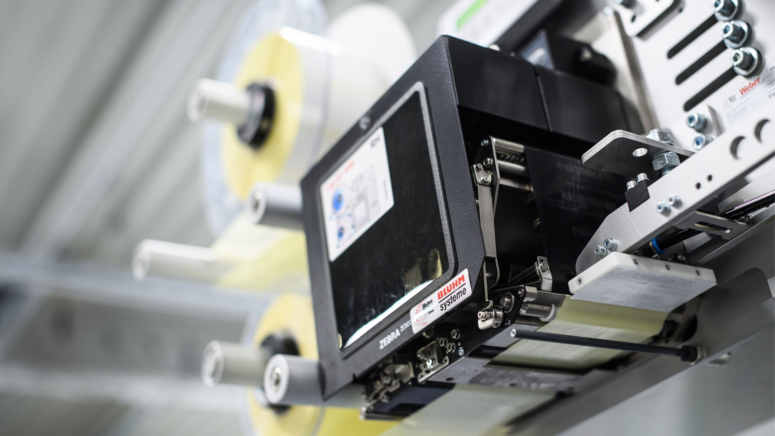 Etiketteringsmaskin - Perfekt för applicering av etiketter i produktionslinjen